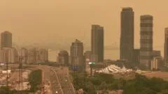Orange haze from Canada wildfires seen in Ontario and northern US