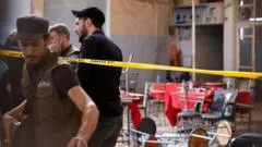 Bomb blast at Damascus cafe kills six, Syrian state media say