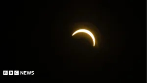 In pictures: Sky watchers gather for solar eclipse