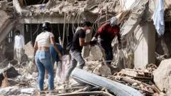 'Every person saved is a miracle': Families call to trapped loved ones in region devastated by Venezuela quakes
