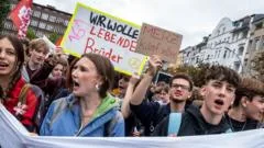 Students strike across Germany in protest against military service