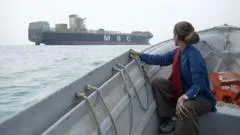 On the Strait of Hormuz, BBC finds seized ships and shark fishermen as uneasy calm returns