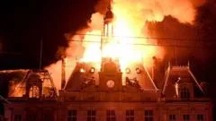 Violent clashes, looting and buildings ablaze in France as over 1,000 arrested after protests